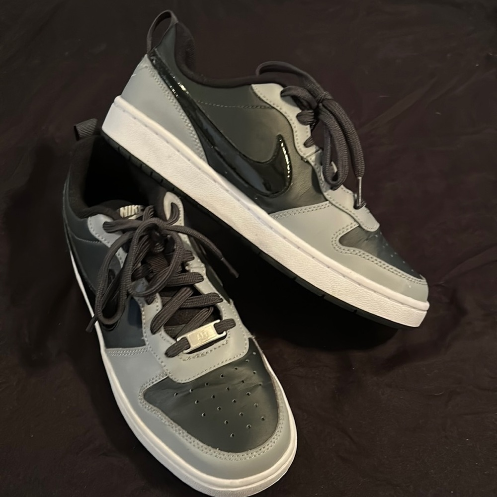 Black and gray nikes